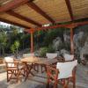 al fresco dining area next to pool